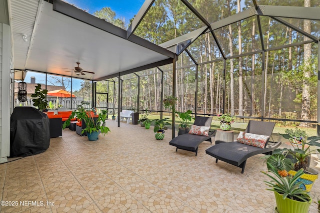 sunroom / solarium with ceiling fan