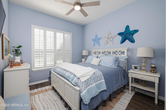 bedroom featuring dark hardwood / wood-style floors and ceiling fan