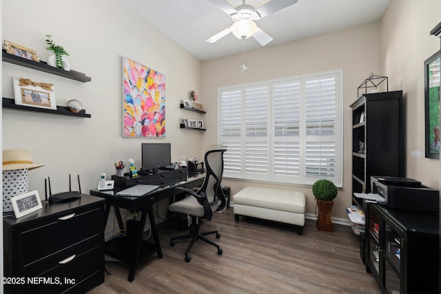 office space featuring wood-type flooring and ceiling fan