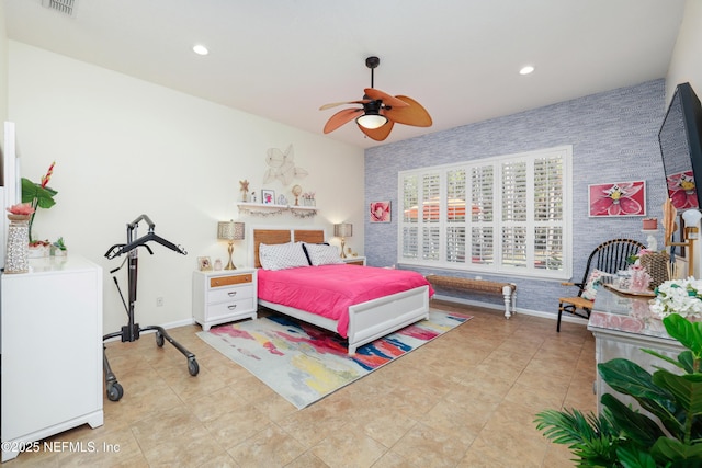 tiled bedroom with a large fireplace