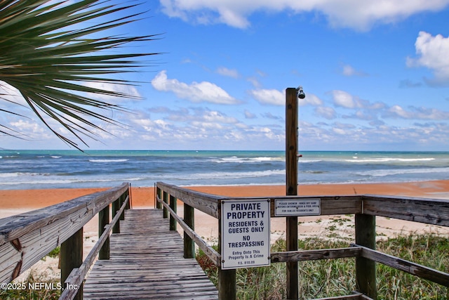 exterior space featuring a beach view