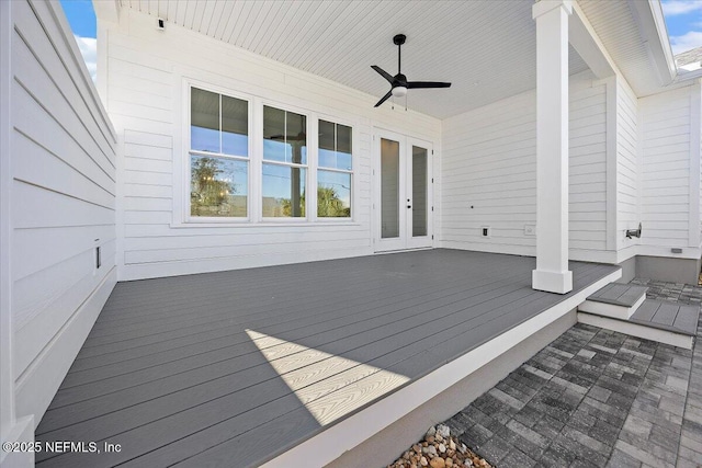 wooden deck with ceiling fan