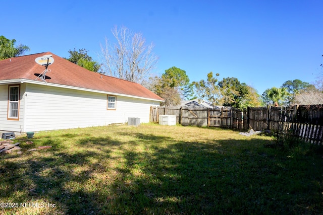 view of yard featuring central AC unit