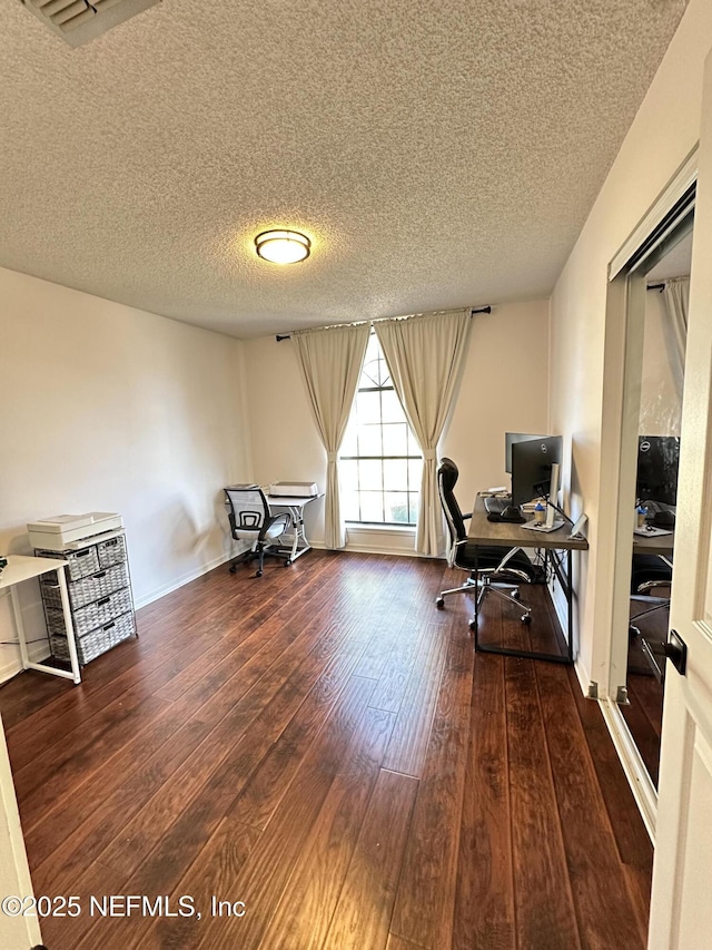 office space with hardwood / wood-style flooring and a textured ceiling