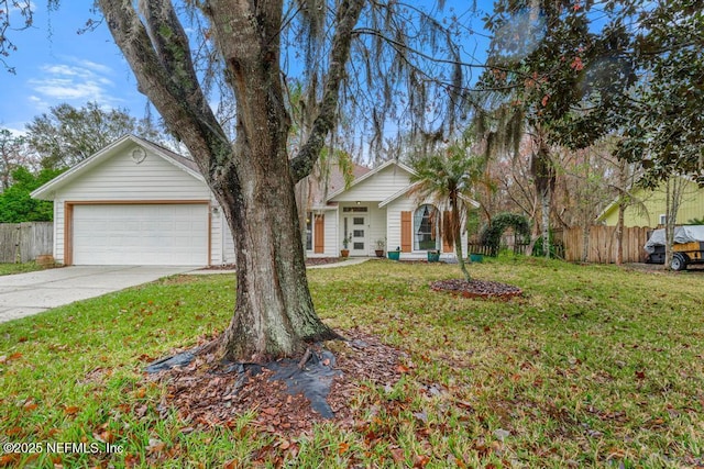 single story home featuring concrete driveway, a front yard, and fence