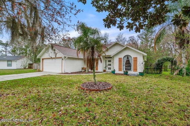 ranch-style home featuring a garage, a front yard, and driveway