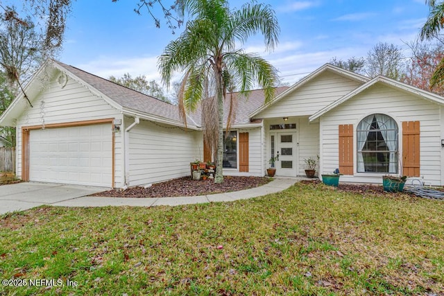 ranch-style house with an attached garage, a front lawn, concrete driveway, and roof with shingles