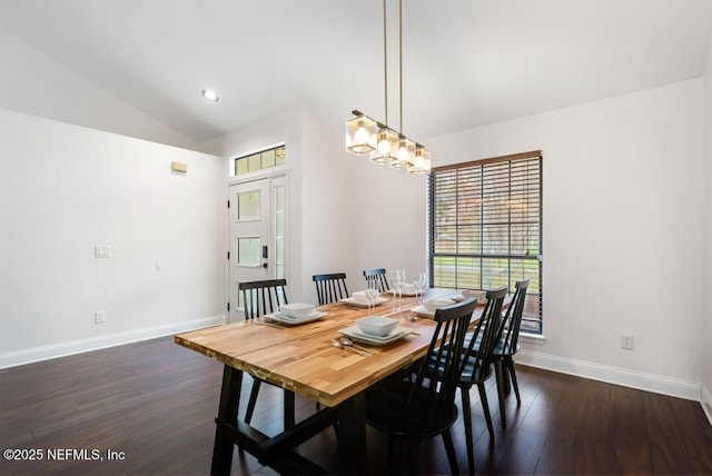 dining space featuring dark wood-type flooring, lofted ceiling, baseboards, and recessed lighting