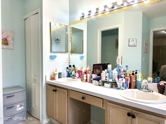 bathroom featuring vanity and tile patterned floors