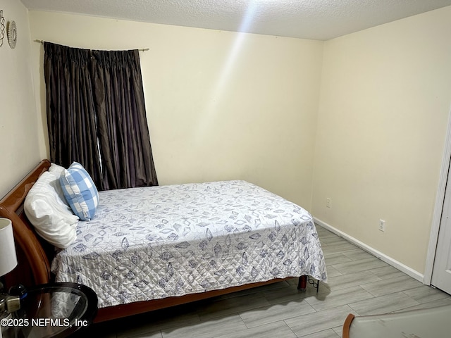 bedroom with a textured ceiling