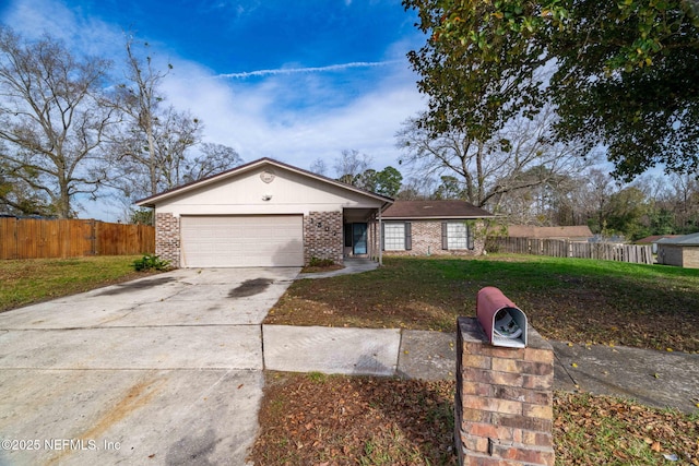 ranch-style home featuring a garage and a front lawn