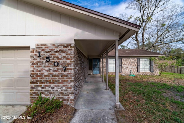 entrance to property featuring a garage