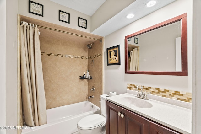 full bathroom featuring vanity, toilet, backsplash, and shower / bath combo with shower curtain