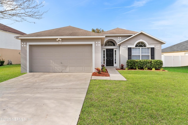 single story home with a garage and a front yard