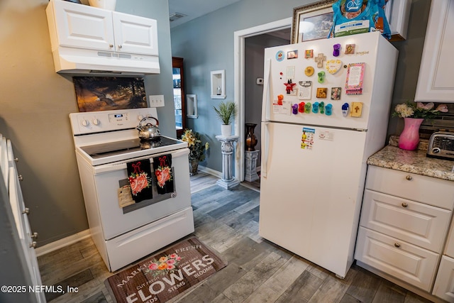 kitchen with white cabinetry, dark wood-type flooring, and white appliances