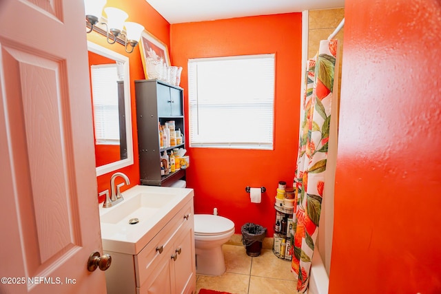 bathroom featuring vanity, curtained shower, tile patterned floors, and toilet