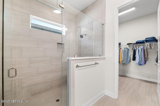 bathroom featuring walk in shower