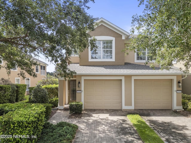 view of property with a garage