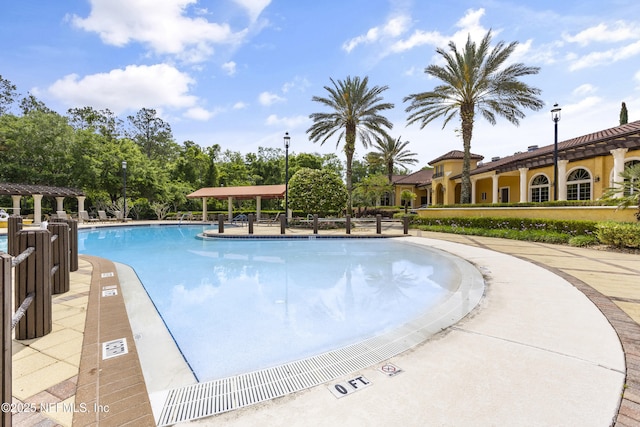 view of pool with a pergola