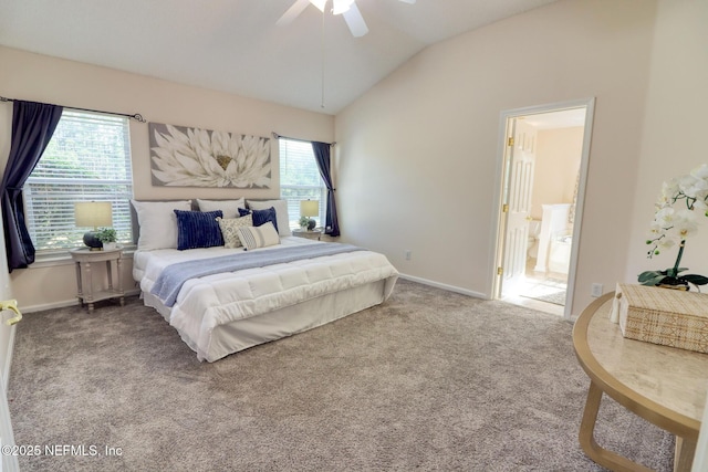 carpeted bedroom with vaulted ceiling and ceiling fan