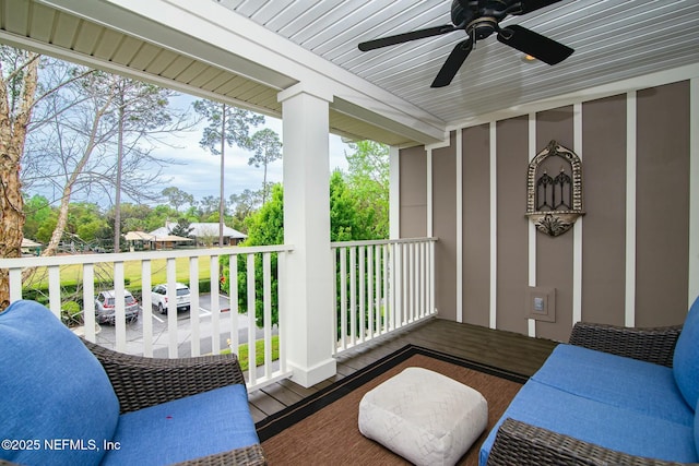 balcony with ceiling fan and a porch