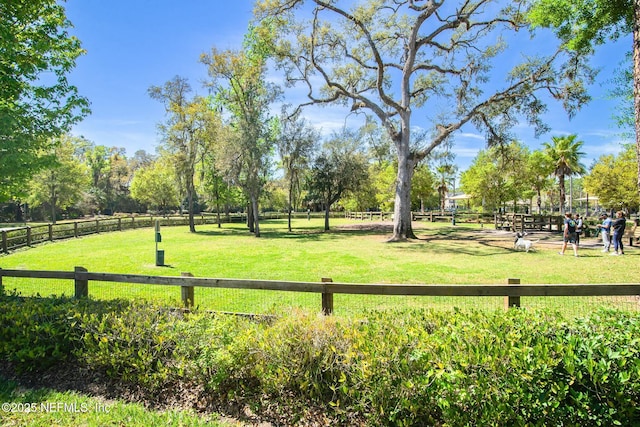 view of home's community featuring a yard