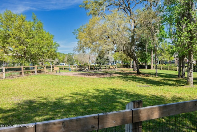 surrounding community with a lawn