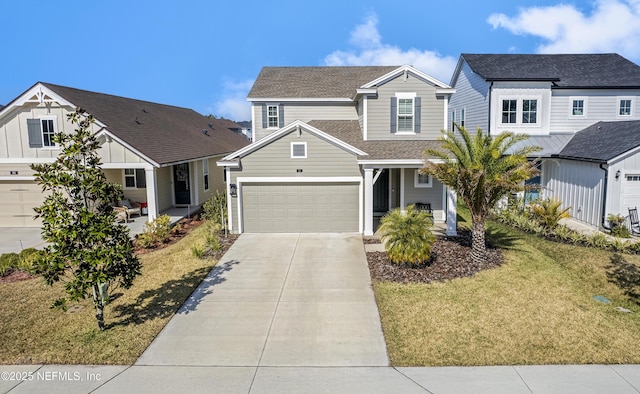 view of front facade featuring a garage and a front lawn