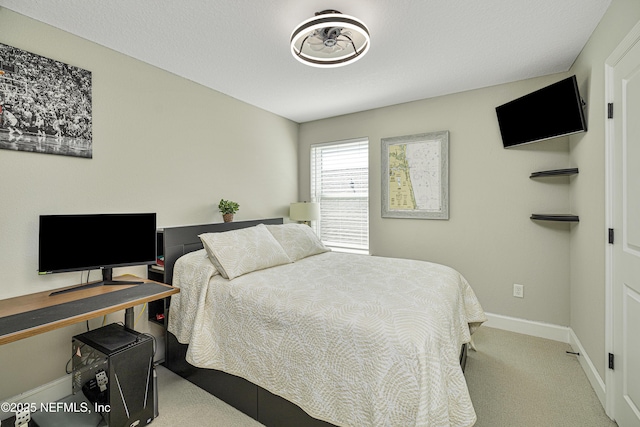 bedroom with light carpet