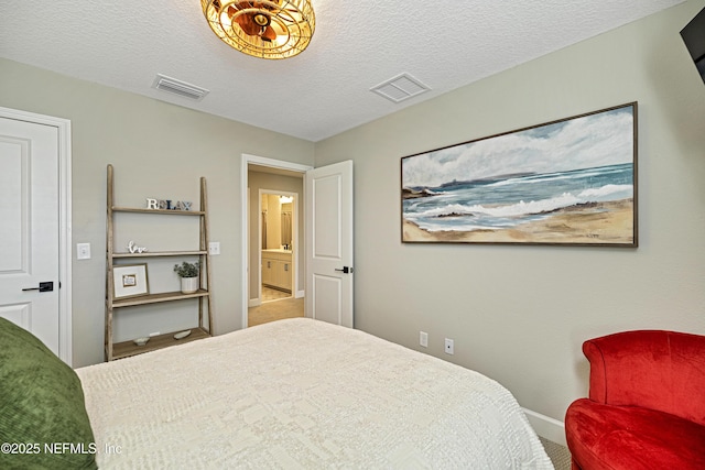 bedroom featuring a textured ceiling