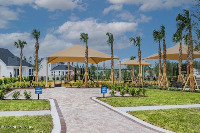 view of play area featuring a yard and fence