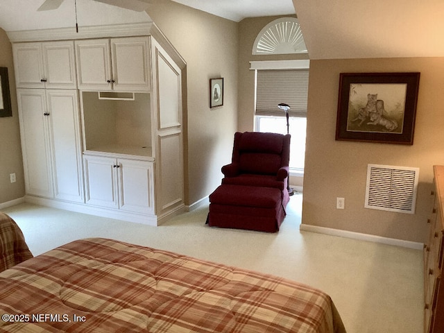 unfurnished bedroom with carpet floors, visible vents, and baseboards