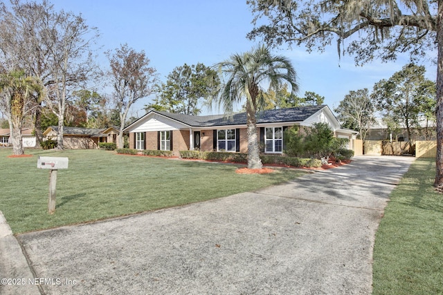 ranch-style house with a front yard