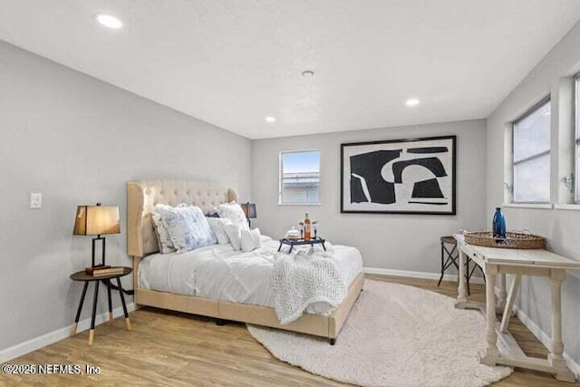 bedroom featuring hardwood / wood-style floors