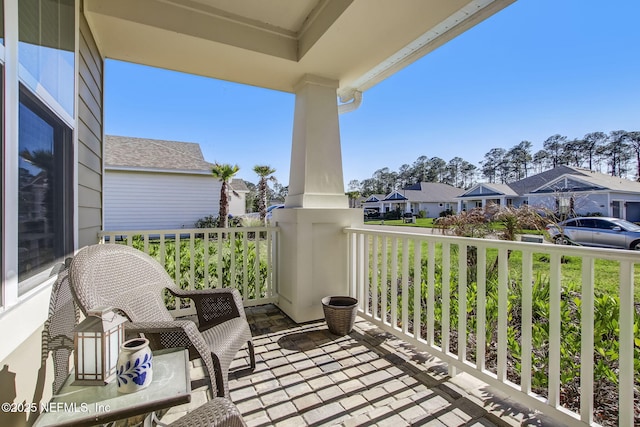 85248 Berryessa Way, Fernandina Beach, FL 32034 - balcony featuring covered porch