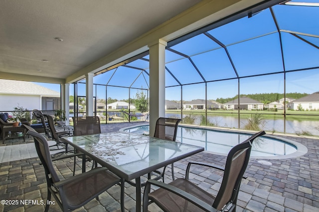 85248 Berryessa Way, Fernandina Beach, FL 32034 - view of patio with a water view and glass enclosure