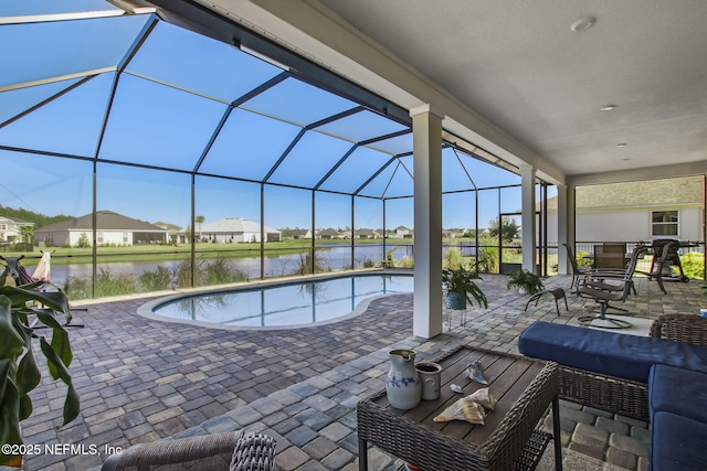 85248 Berryessa Way, Fernandina Beach, FL 32034 - view of pool featuring a water view, a lanai, and a patio area