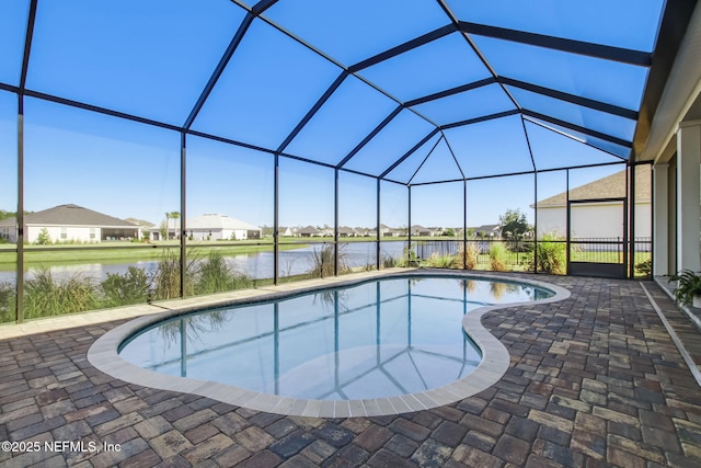 85248 Berryessa Way, Fernandina Beach, FL 32034 - view of swimming pool with a water view, a lanai, and a patio area
