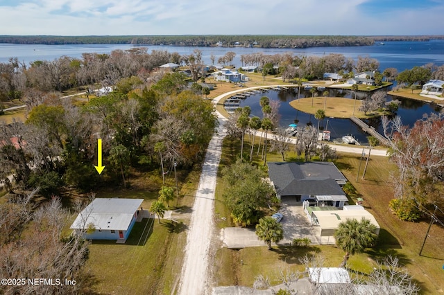 bird's eye view with a water view