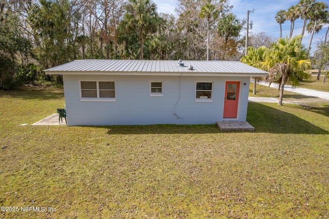 exterior space with a lawn