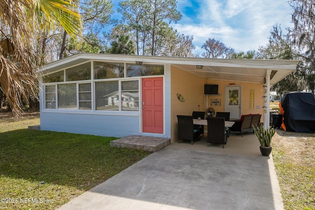 exterior space with a lawn