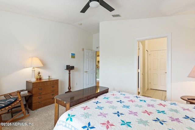 carpeted bedroom with lofted ceiling and ceiling fan