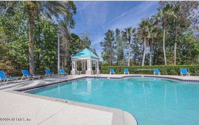 view of pool featuring a gazebo and a patio area