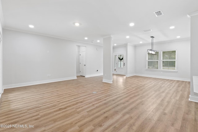 85034 Southern Creek Blvd, Fernandina Beach, FL 32034 - unfurnished living room with ornamental molding and light hardwood / wood-style flooring