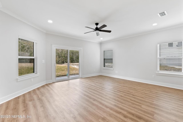 85034 Southern Creek Blvd, Fernandina Beach, FL 32034 - unfurnished room featuring ceiling fan, ornamental molding, and light wood-type flooring
