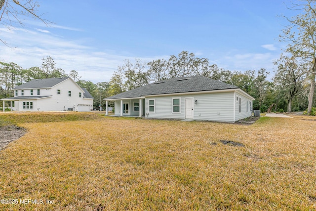85034 Southern Creek Blvd, Fernandina Beach, FL 32034 - back of property with a lawn