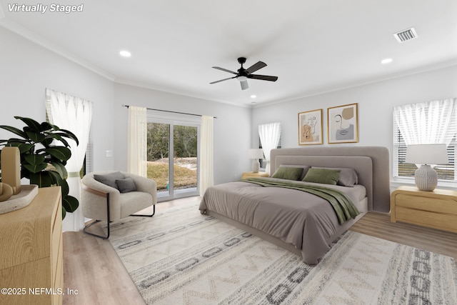 85034 Southern Creek Blvd, Fernandina Beach, FL 32034 - bedroom with crown molding, ceiling fan, light hardwood / wood-style floors, and access to outside