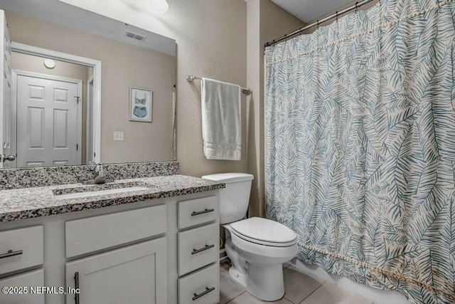 full bath featuring tile patterned flooring, visible vents, vanity, and toilet