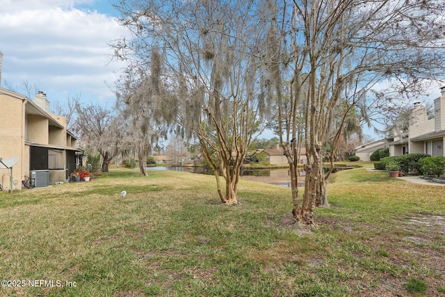 view of yard featuring central AC unit