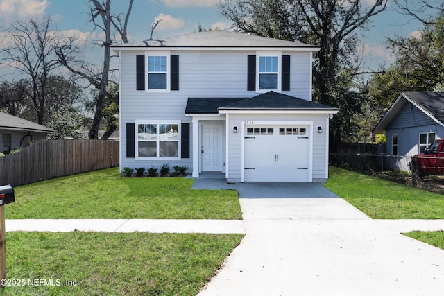 front facade featuring a garage and a front yard